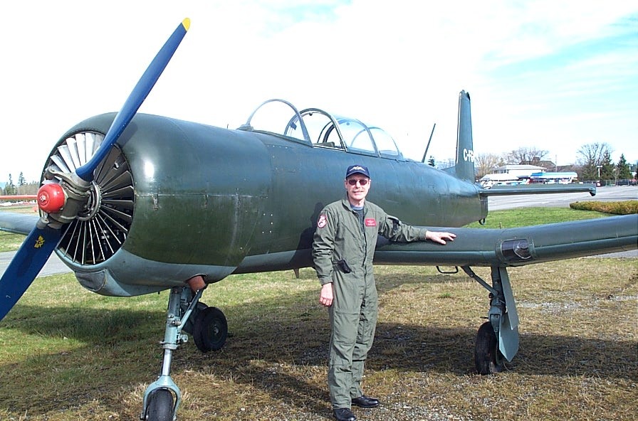 Flight Instructor  Peter Waddington with his Nanchang.  Langley Flying School